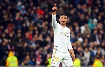 Real Madrid's Brazilian midfielder Casemiro celebrates his second goal during the Spanish league football match between Real Madrid CF and Sevilla FC at the Santiago Bernabeu stadium in Madrid