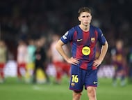 Barcelona's Spanish midfielder #16 Fermin Lopez reacts at the end of the UEFA Champions League quarter final first leg football match between FC Barcelona and Club Atletico de Madrid at Camp Nou Stadium in Barcelona on April 8, 2026. Atletico Madrid won 0-2. (Photo by Josep LAGO / AFP)