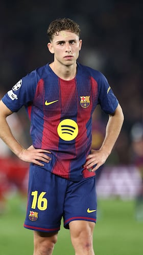 Barcelona's Spanish midfielder #16 Fermin Lopez reacts at the end of the UEFA Champions League quarter final first leg football match between FC Barcelona and Club Atletico de Madrid at Camp Nou Stadium in Barcelona on April 8, 2026. Atletico Madrid won 0-2. (Photo by Josep LAGO / AFP)