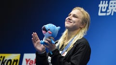 Gold medallist Lithuania's Ruta Meilutyte celebrates during the medals ceremony for the women's 50m breaststroke swimming event during the World Aquatics Championships in Fukuoka on July 30, 2023. (Photo by Fran�ois-Xavier MARIT / AFP)