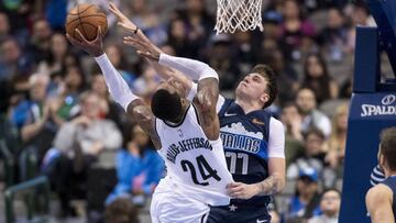 Nov 21, 2018; Dallas, TX, USA; Brooklyn Nets forward Rondae Hollis-Jefferson (24) is fouled by Dallas Mavericks forward Luka Doncic (77) during the second half at the American Airlines Center. Mandatory Credit: Jerome Miron-USA TODAY Sports