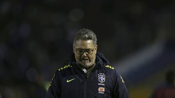Brazil's coach Rogerio Micale walks off the field after his team failed to classify for the 2017 South Korea U-20 World Cup, following a game with Colombia, which ended 0-0 in Quito, Ecuador, Saturday, Feb. 11, 2017. Colombia had already been disqualified. (AP Photo/Dolores Ochoa)