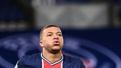 Paris Saint-Germain&#039;s French forward Kylian Mbappe celebrates scoring his team&#039;s third goal during the French L1 football match between Paris Saint-Germain (PSG) and Dijon at the Parc de Princes stadium in Paris on October 24, 2020. (Photo by FR