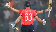 Jos Buttler and Joe Root celebrate after defeating New Zealand. 