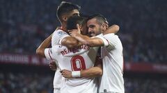 SEVILLE, SPAIN - OCTOBER 28:  Wissam Ben Yedder of Sevilla FC (C) celebrates after scoring the first goal for Sevilla FC with Pablo Sarabia of Sevilla FC (R) during the La Liga match between Sevilla and Leganes at  Estadio Sanchez Pizjuan on October 28, 2017 in Seville, .  (Photo by Aitor Alcalde Colomer/Getty Images)