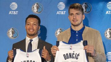 Jun 22, 2018; Dallas, TX, USA; Dallas Mavericks second round pick Jalen Brunson, point guard Villanova (left) and Mavericks first round pick Luka Doncic, guard Slovenia, (right) pose for a photo with their jerseys during a press conference at the American Airlines Center. Mandatory Credit: Jerome Miron-USA TODAY Sports