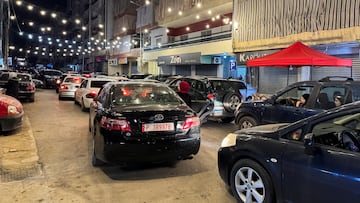 People leave in their cars after Israeli strikes on Beirut's southern suburbs, Lebanon, March 2, 2026. Picture taken with a mobile phone. REUTERS/Ahmad Al Kerdi