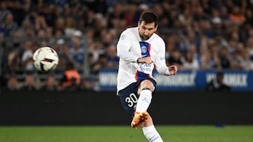 Paris Saint-Germain's Argentine forward Lionel Messi kicks the ball during the French L1 football match between RC Strasbourg Alsace and Paris Saint-Germain (PSG) at Stade de la Meinau in Strasbourg, eastern France on May 27, 2023. (Photo by PATRICK HERTZOG / AFP)