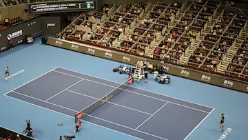 Russia�s Daniil Medvedev (R) hits a return to Germany�s Alexander Zverev during their men's singles semifinal match at the China Open tennis tournament in Beijing on October 3, 2023. (Photo by Pedro PARDO / AFP)