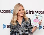 What did Kelly Ripa say about former co-host Regis Philbin in her book?