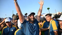 Europe's golfers including Spanish golfer, Jon Rahm (C) andEnglish golfer, Justin Rose celebrate their victory after the singles matches on the final day of play in the 44th Ryder Cup at the Marco Simone Golf and Country Club in Rome on October 1, 2023. Tommy Fleetwood clinched the crucial half-point as Europe regained the Ryder Cup from a battling United States taking an unassailable lead despite a blistering American singles charge. (Photo by Paul ELLIS / AFP)