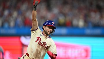 Oct 6, 2024; Philadelphia, Pennsylvania, USA; Philadelphia Phillies shortstop Trea Turner (7) celebrates after scoring the game wining run in the ninth inning against the New York Mets during game two of the NLDS for the 2024 MLB Playoffs at Citizens Bank Park. Mandatory Credit: Kyle Ross-Imagn Images