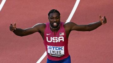 USA's Noah Lyles crosses the finish line to win the men's 100m final during the World Athletics Championships at the National Athletics Centre in Budapest on August 20, 2023. (Photo by Ferenc ISZA / AFP)