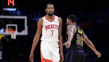 LOS ANGELES, CALIFORNIA - APRIL 21: Kevin Durant #7 of the Houston Rockets walks past Marcus Smart #36 of the Los Angeles Lakers during the second half of Game Two of the NBA Western Conference First Round Playoffs at Crypto.com Arena on April 21, 2026 in Los Angeles, California. NOTE TO USER: User expressly acknowledges and agrees that, by downloading and or using this photograph, User is consenting to the terms and conditions of the Getty Images License Agreement. Ronald Martinez/Getty Images/AFP (Photo by RONALD MARTINEZ / GETTY IMAGES NORTH AMERICA / Getty Images via AFP)
