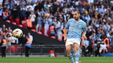 Soccer Football - Community Shield - Manchester City v Arsenal - Wembley Stadium, London, Britain - August 6, 2023  Manchester City's Bernardo Silva scores a penalty during the penalty shootout REUTERS/Dylan Martinez