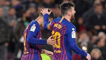 Barcelona&#039;s Brazilian midfielder Philippe Coutinho (L) celebrates with Barcelona&#039;s Argentinian forward Lionel Messi after scoring during the Spanish Copa del Rey (King&#039;s Cup) quarter-final second leg football match between Barcelona and Sev