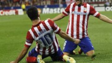 DÚO DE GENIOS. Koke celebra con Arda el gol del turco al Zenit.