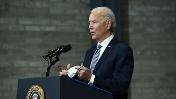 US President Joe Biden speaks at the Pfizer Kalamazoo Manufacturing Site February 19, 2021, in Portage, Michigan. (Photo by Brendan Smialowski / AFP)