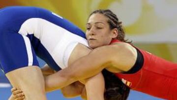<b>DERROTA.</b> La española Teresa Méndez perdió hoy su primer combate de la modalidad de lucha libre de los Juegos Olímpicos de Pekín 2008 en la categoría de 63 kilos ante la francesa Lise Legrand.