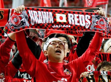 Soccer Football - Japan's Urawa Red Diamonds v Saudi Arabia's Al Hilal - AFC Champions League final, second leg - Saitama Stadium 2002, Saitama, Japan - November 25, 2017. Urawa Red Diamonds' fans celebrate.