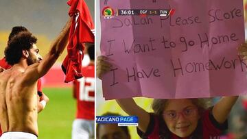 Im&aacute;genes de Mohamed Salah celebrando el gol de la victoria de Egipto ante T&uacute;nez en el partido de clasificaci&oacute;n de la Copa &Aacute;frica del 16 de noviembre y de una ni&ntilde;a con una pancarta en la que le pide que marque gol pronto porque tiene deberes. 