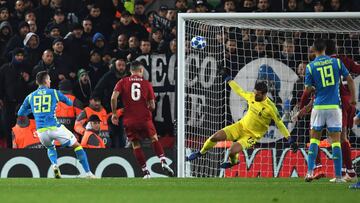 Liverpool's Brazilian goalkeeper Alisson Becker (2R) saves a shot from Napoli's Polish striker Arkadiusz Milik (L) during the UEFA Champions League group C
