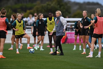 Martina Voss-Tecklenburg instructs her players during an open training session ahead of the FIFA Women's World Cup.