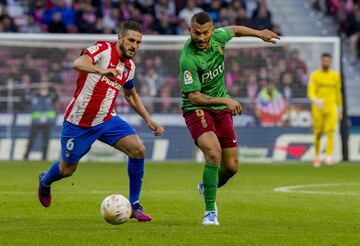 koke y Luis Suárez