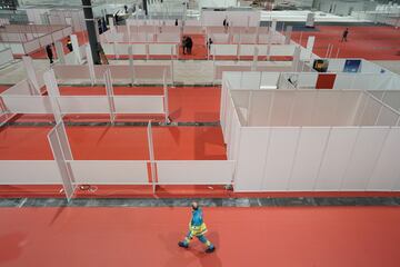 As Spain fights the spread of Covid-19, Madrid's IFEMA conference centre has been repurposed as a temporary hospital, with 5,500 beds.