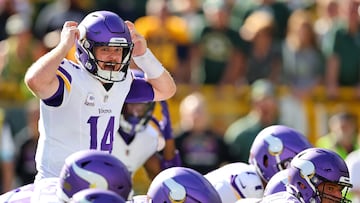 GREEN BAY, WISCONSIN - SEPTEMBER 29: Sam Darnold #14 of the Minnesota Vikings calls a play at the line during a game against the Green Bay Packers at Lambeau Field on September 29, 2024 in Green Bay, Wisconsin. (Photo by Stacy Revere/Getty Images)