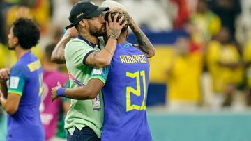 LUSAIL CITY, QATAR - DECEMBER 02: Neymar of Brazil and Rodrygo of Brazil hug each other after the FIFA World Cup Qatar 2022 Group G match between Cameroon and Brazil at Lusail Stadium on December 2, 2022 in Lusail City, Qatar. (Photo by Tnani Badreddine/DeFodi Images via Getty Images)