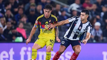 Alejandro Zendejas (L) of America fights for the ball with Jorge Rodriguez (R) of America during the quarter-final first match between Monterrey and America as part of the Liga BBVA MX, Torneo Apertura 2025 at BBVA Bancomer Stadium, on November 26, 2025 in Monterrey, Nuevo Leon, Mexico.