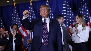 Republican presidential candidate and former U.S. President Donald Trump gestures during his New Hampshire presidential primary election night watch party, in Nashua, New Hampshire, U.S., January 23, 2024. REUTERS/Mike Segar