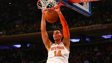 Nov 29, 2017; New York, NY, USA; New York Knicks center Willy Hernangomez (14) dunks the ball over Miami Heat forward Jordan Mickey (25) during the second half at Madison Square Garden. Mandatory Credit: Andy Marlin-USA TODAY Sports