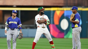 Mar 8, 2026; Houston, TX, United States; Mexico left fielder Randy Arozarena (56) reacts to his stand up double against Brazil in the first inning at Daikin Park. Mandatory Credit: Thomas Shea-Imagn Images