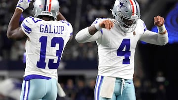 ARLINGTON, TEXAS - NOVEMBER 12: Dak Prescott #4 of the Dallas Cowboys celebrates a touchdown pass with Michael Gallup #13 of the Dallas Cowboys during the third quarter against the New York Giants at AT&T Stadium on November 12, 2023 in Arlington, Texas.   Sam Hodde/Getty Images/AFP (Photo by Sam Hodde / GETTY IMAGES NORTH AMERICA / Getty Images via AFP)