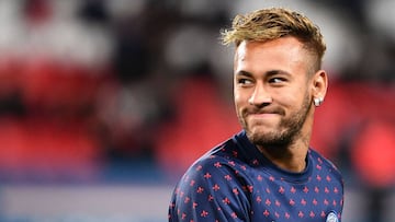 (FILES) In this file photo taken on October 07, 2018 Paris Saint-Germain&#039;s Brazilian forward Neymar smiles during warm up prior to the French L1 football match between Paris Saint-Germain (PSG) and Olympique de Lyon (OL) at the Parc des Princes stadi