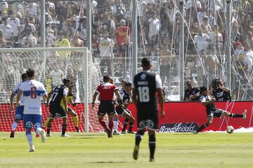 El jugador de Universidad Católica Jose Pedro Fuenzalida, fuera de la foto,  marca un gol contra Colo Colo durante el partido de primera division realizado en el estadio Monumental de Santiago, Chile
