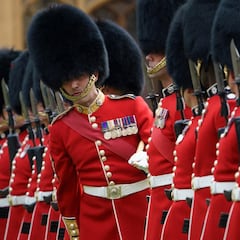 Why do the King’s Guard wear those hats?