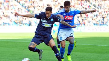 Soccer Football - Serie A - SPAL v Napoli - Paolo Mazza, Ferrara, Italy - October 27, 2019 SPAL's Alessandro Murgia in action with Napoli's Giovanni Di Lorenzo REUTERS/Jennifer Lorenzini