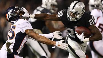 Latavius Murray #28 of the Oakland Raiders carries the ball during the second quarter against the Denver Broncos at Oakland-Alameda County Coliseum on November 6, 2016 in Oakland, California.   
 Latavius Murray rushed for 114 yards and a career-high three touchdowns Sunday as the Oakland Raiders downed the Super Bowl champion Denver Broncos 30-20 to seize the NFL&#039;s AFC West division lead. / AFP PHOTO / GETTY IMAGES NORTH AMERICA / EZRA SHAW