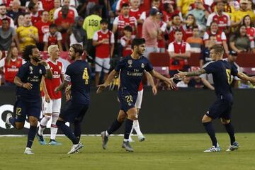 Real Madrid's Marco Asensio celebrates after scoring the equaliser against Arsenal in the International Champions Cup
