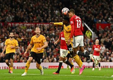 Soccer Football - Premier League - Manchester United v Wolverhampton Wanderers - Old Trafford, Manchester, Britain - August 14, 2023  Manchester United's Raphael Varane scores their first goal REUTERS/Dylan Martinez EDITORIAL USE ONLY. No use with unauthorized audio, video, data, fixture lists, club/league logos or 'live' services. Online in-match use limited to 75 images, no video emulation. No use in betting, games or single club /league/player publications.  Please contact your account representative for further details.