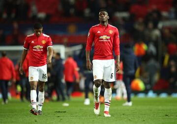 Paul Pogba and Marcus Rashford look dejected after Tuesday's Champions League defeat to Sevilla at Old Trafford.