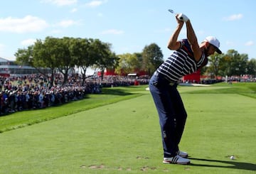 Johnson hits off the tee during practice prior to the 2016 Ryder Cup.