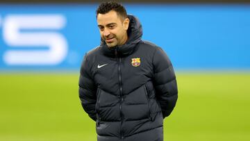 MUNICH, GERMANY - DECEMBER 07: Xavier Hernández i Creus, head coach of FC Barcelona looks on during a FC Barcelona training session at Allianz Arena on December 07, 2021 in Munich, Germany. (Photo by Alexander Hassenstein/Getty Images)