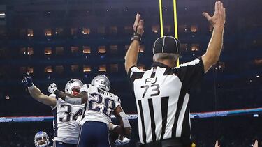 DETROIT, MI - SEPTEMBER 23: James White #28 of the New England Patriots celebrates his touchdown with Rex Burkhead #34 against the Detroit Lions during the third quarter at Ford Field on September 23, 2018 in Detroit, Michigan. Rey Del Rio/Getty Images/AFP
== FOR NEWSPAPERS, INTERNET, TELCOS & TELEVISION USE ONLY ==