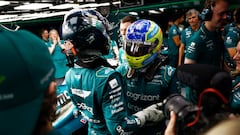 Lance Stroll, Aston Martin F1 Team, and Fernando Alonso, Aston Martin F1 Team, in the garage after Qualifying.