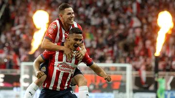 Gilberto Sepulveda (R) of Guadalajara celebrates his goal against Atlas with teammates during their Mexican Clausura tournament football match, at the Akron stadium, in Guadalajara, Jalisco State, Mexico, on May 14, 2023. (Photo by ULISES RUIZ / AFP)