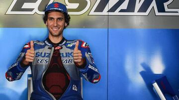 Suzuki Ecstar's Spanish rider Alex Rins gives a thumb's up during the first day of the pre-season MotoGP winter test at the Sepang International Circuit in Sepang on February 7, 2020. (Photo by Mohd RASFAN / AFP)